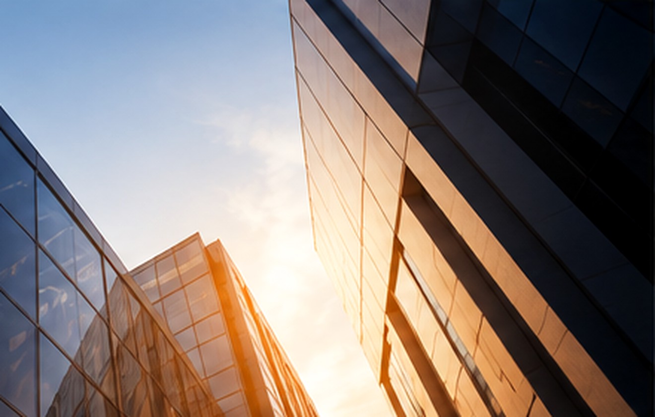 Modern glass architecture in warm evening light